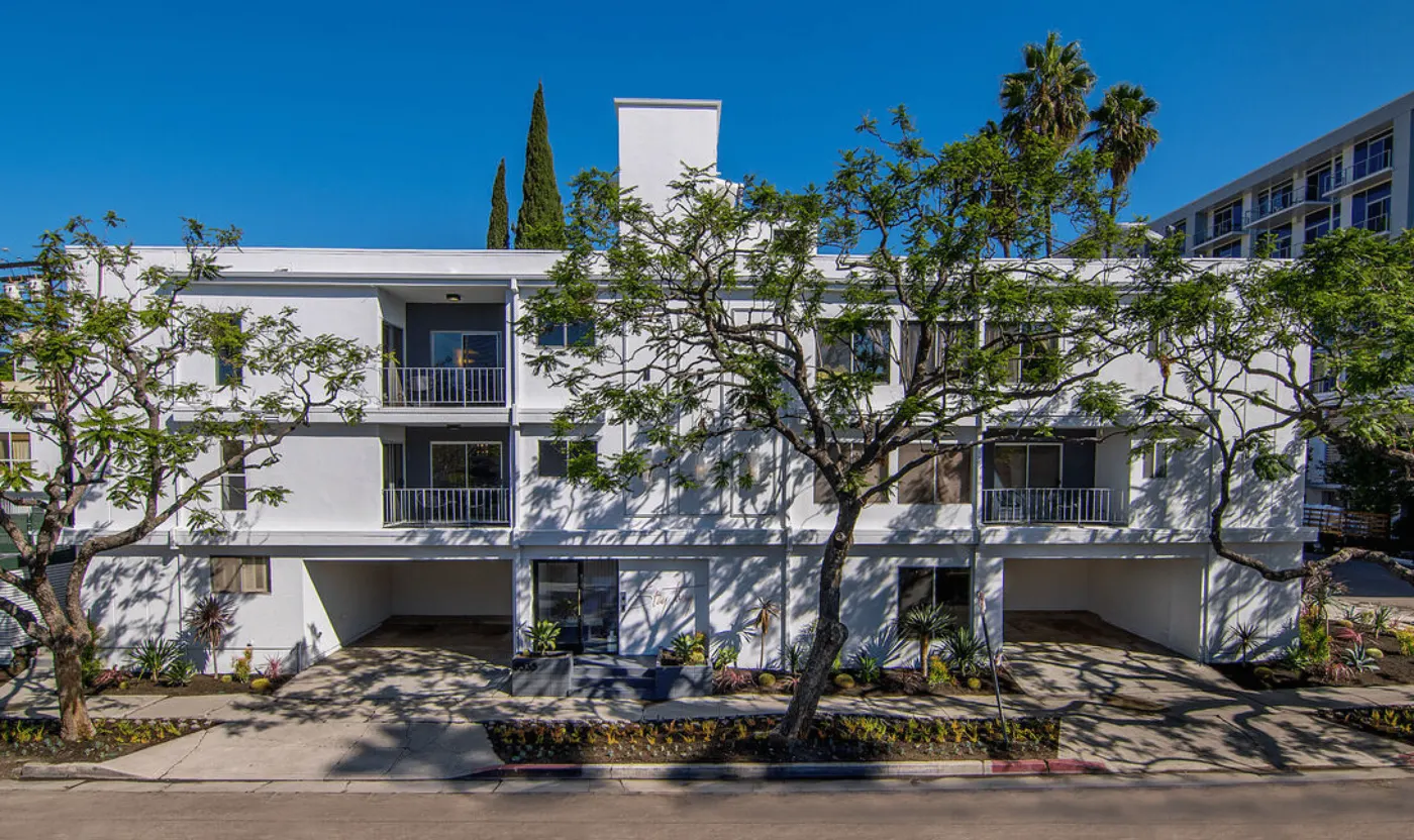 8535 Colgate Ave, a two-story apartment building over parking in Beverly Grove, Los Angeles